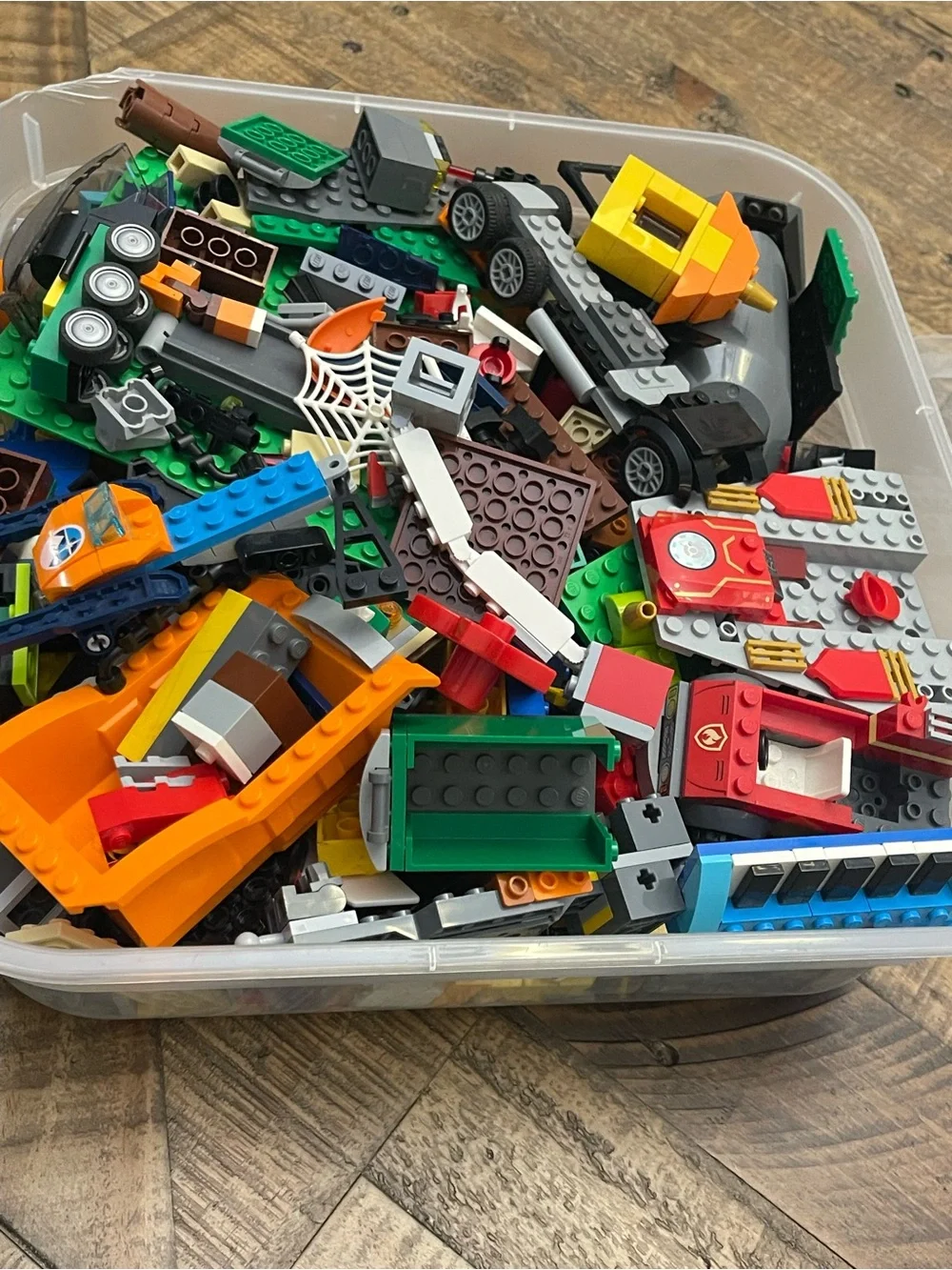 mixed assortment of LEGO brand bricks, plates, and specialty components